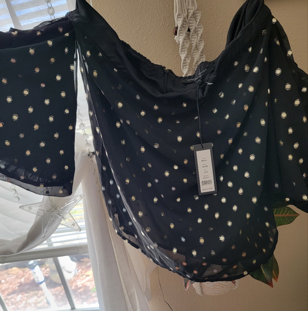 Black Blouse with Flutter Sleeves and Ruffled Style